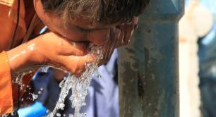 A child drinks clean water